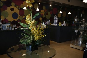 Interior of Petal Creations showing yellow flowers