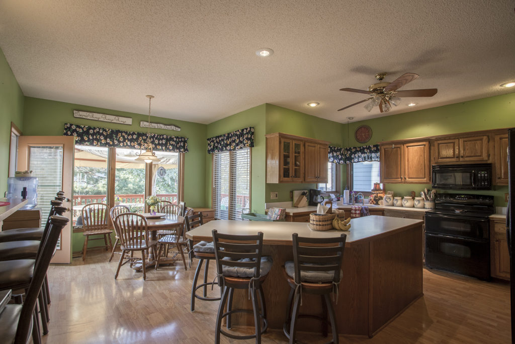 large kitchen with greenwalls