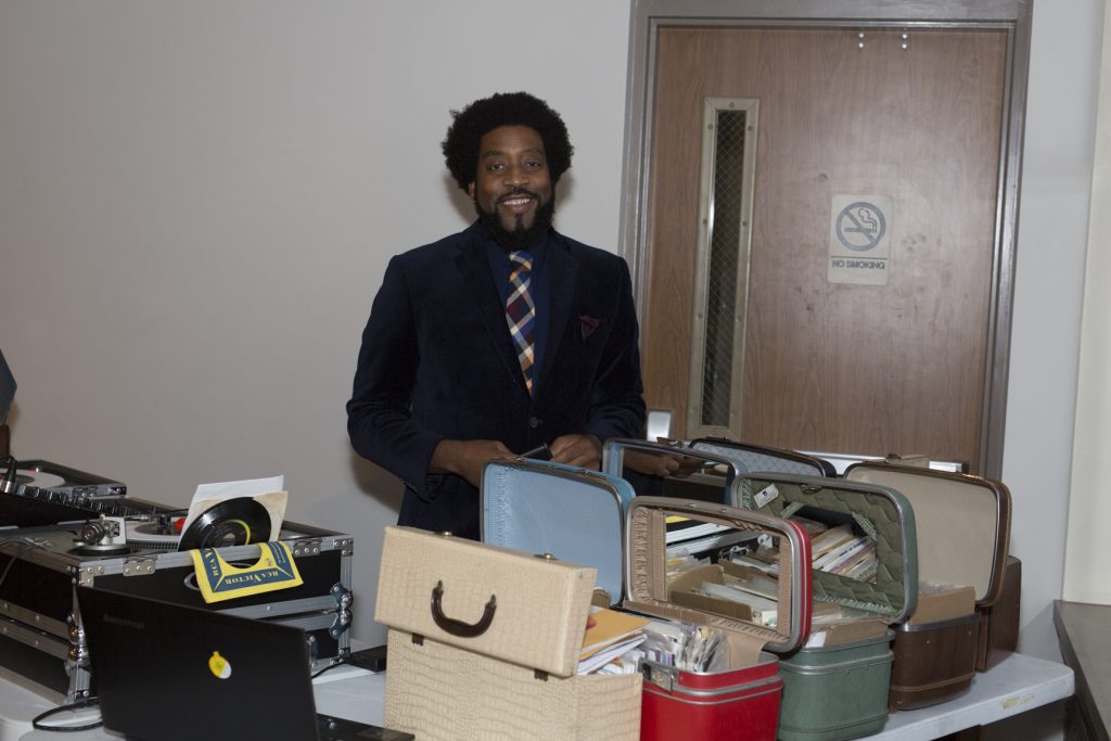 DJ shows his vinyl records