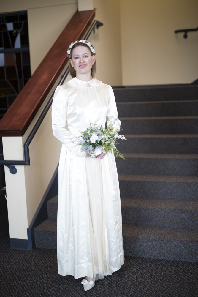 woman wears old-time wedding gown