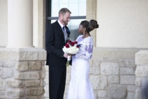 Kevin and Maggie share a moment outside their il Palazzo wedding in Omaha.
