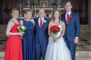 bride and groom with immediate family