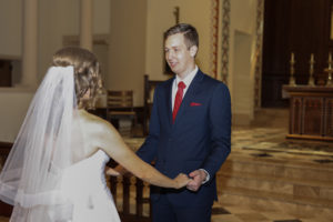 groom sees bride at first look