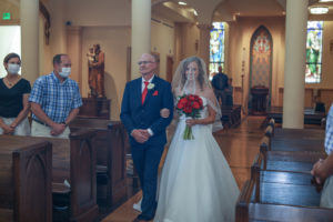 father walks bride down the aisle