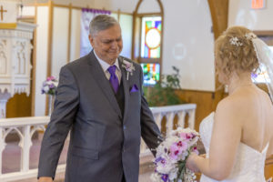 father of the bride sees his daughter