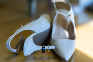 white shoes with rings on heels