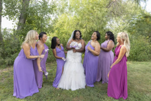 bride and bridesmaids laugh